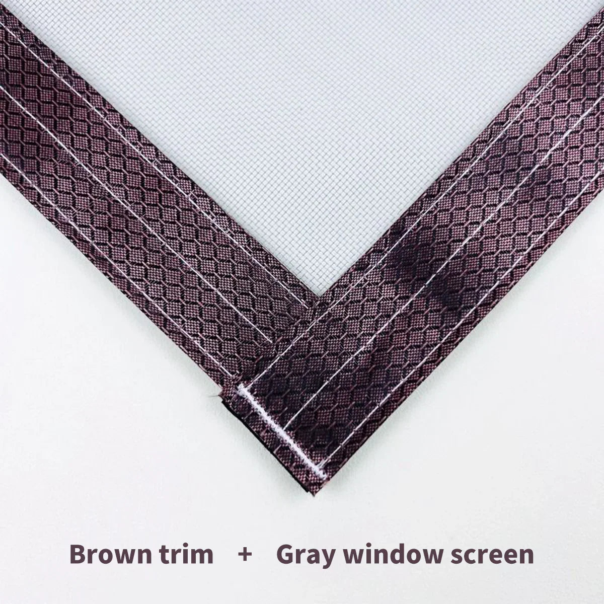 Gray window screen with patterned brown trim, close-up detail, custom screen door material