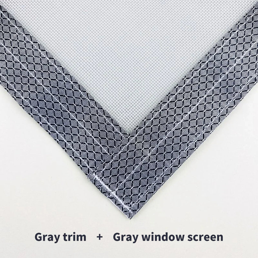 Close-up of gray window screen mesh with patterned gray trim, home window accessory.